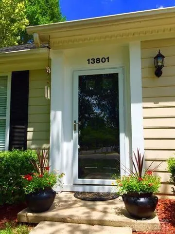 a view of a entryway door front of house