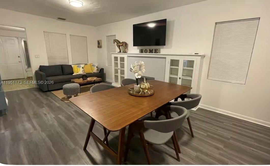 2993 Southwest 16th Terrace Miami, FL 33145 - Photo 3 of 17 a living room with furniture and a flat screen tv