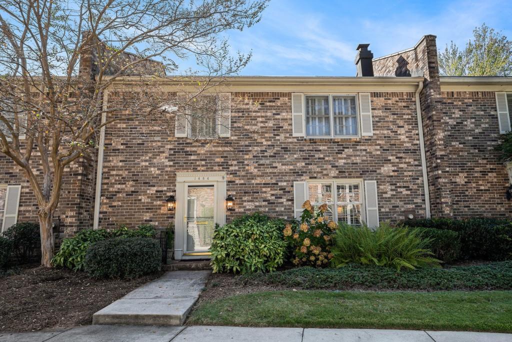 1484 Leafmore Place Decatur, GA 30033 - Photo 4 of 33 a front view of a house with garden