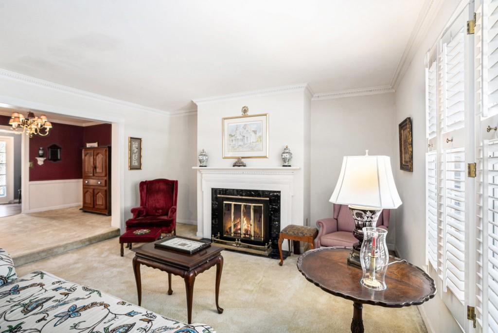 1484 Leafmore Place Decatur, GA 30033 - Photo 8 of 33 a living room with furniture and a fireplace