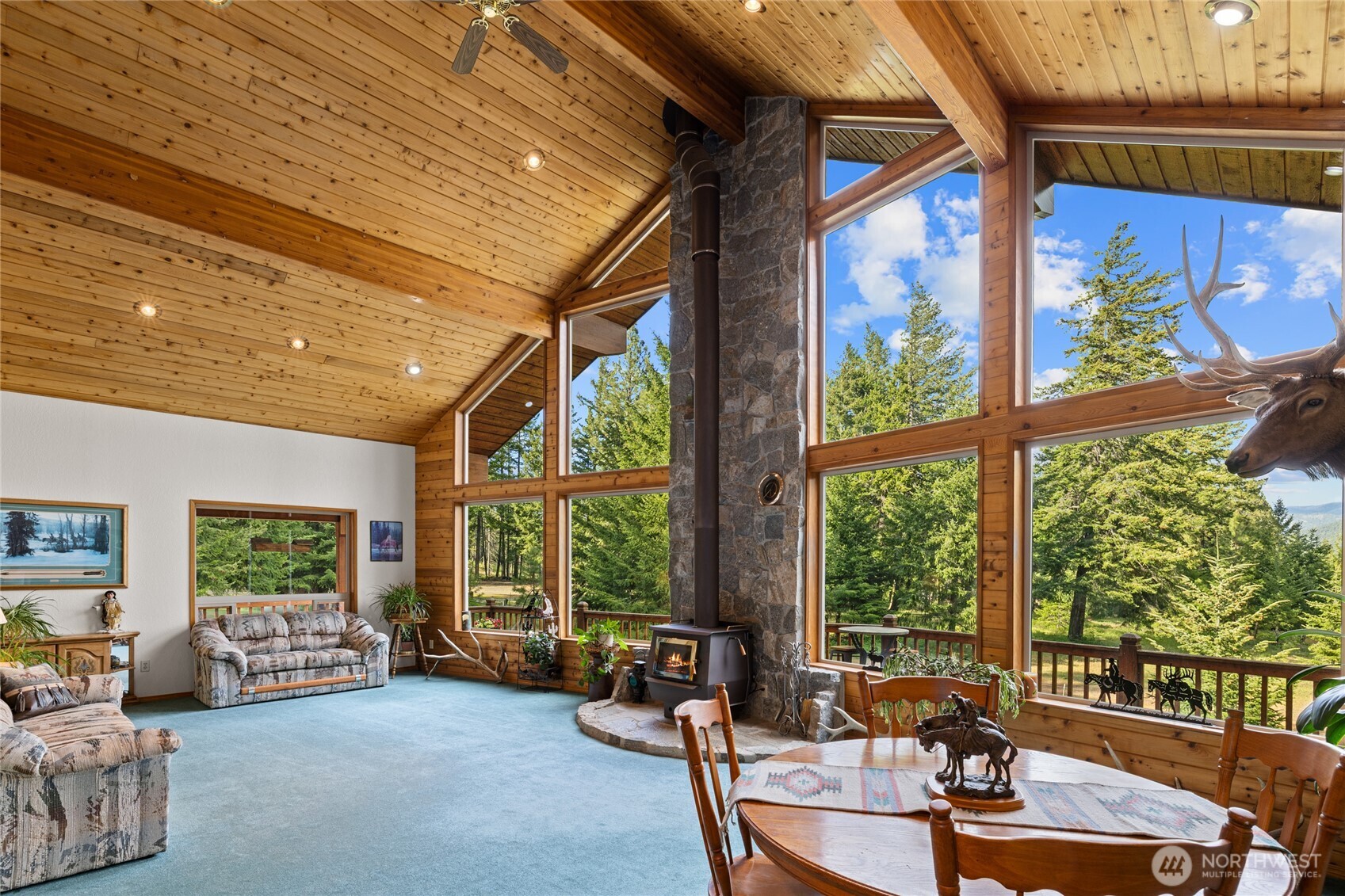 1101 Emerick Road Cle Elum, WA 98922 - Photo 21 of 40 a living room with furniture and large windows