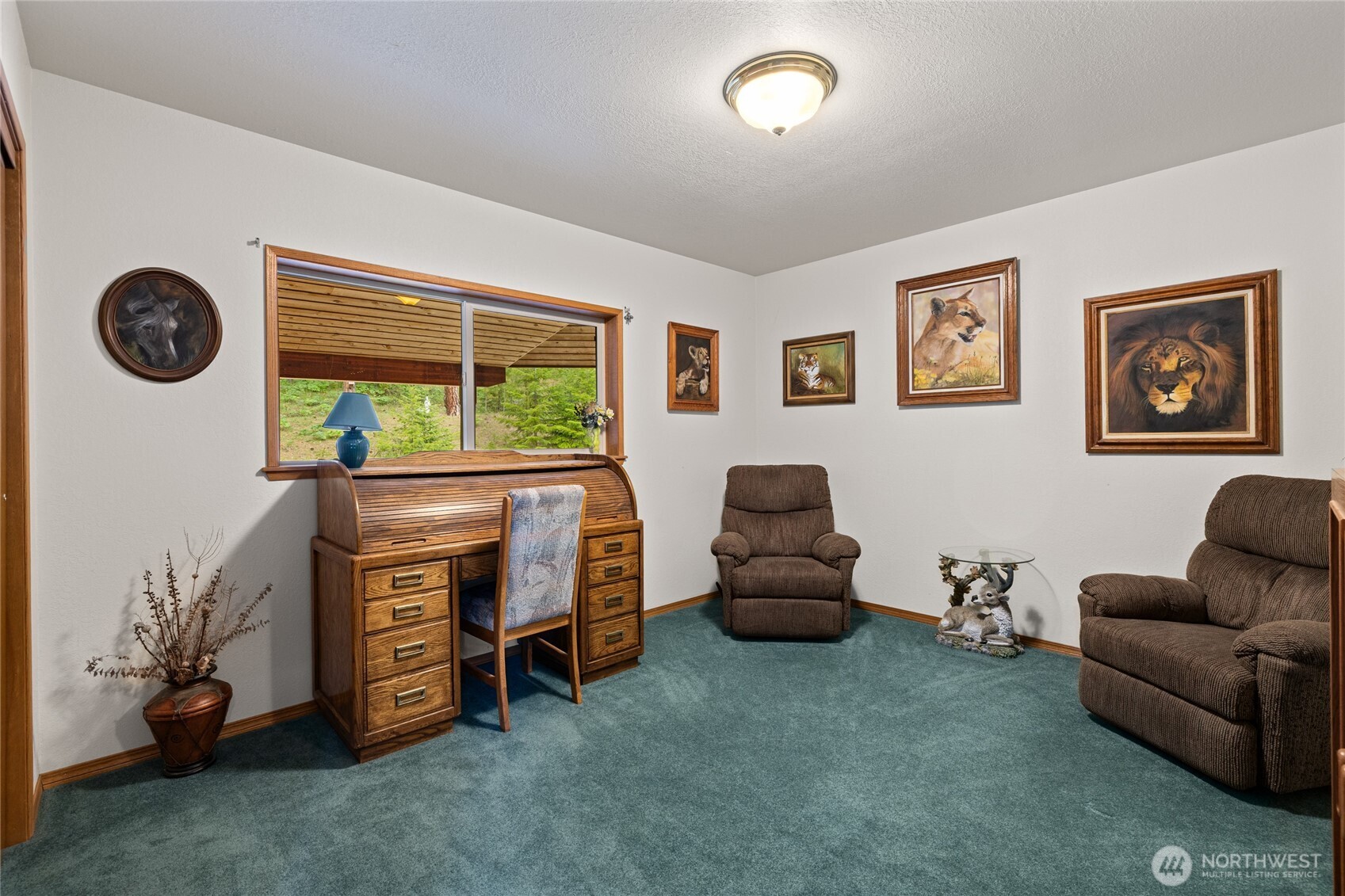 1101 Emerick Road Cle Elum, WA 98922 - Photo 28 of 40 a living room with furniture and a window