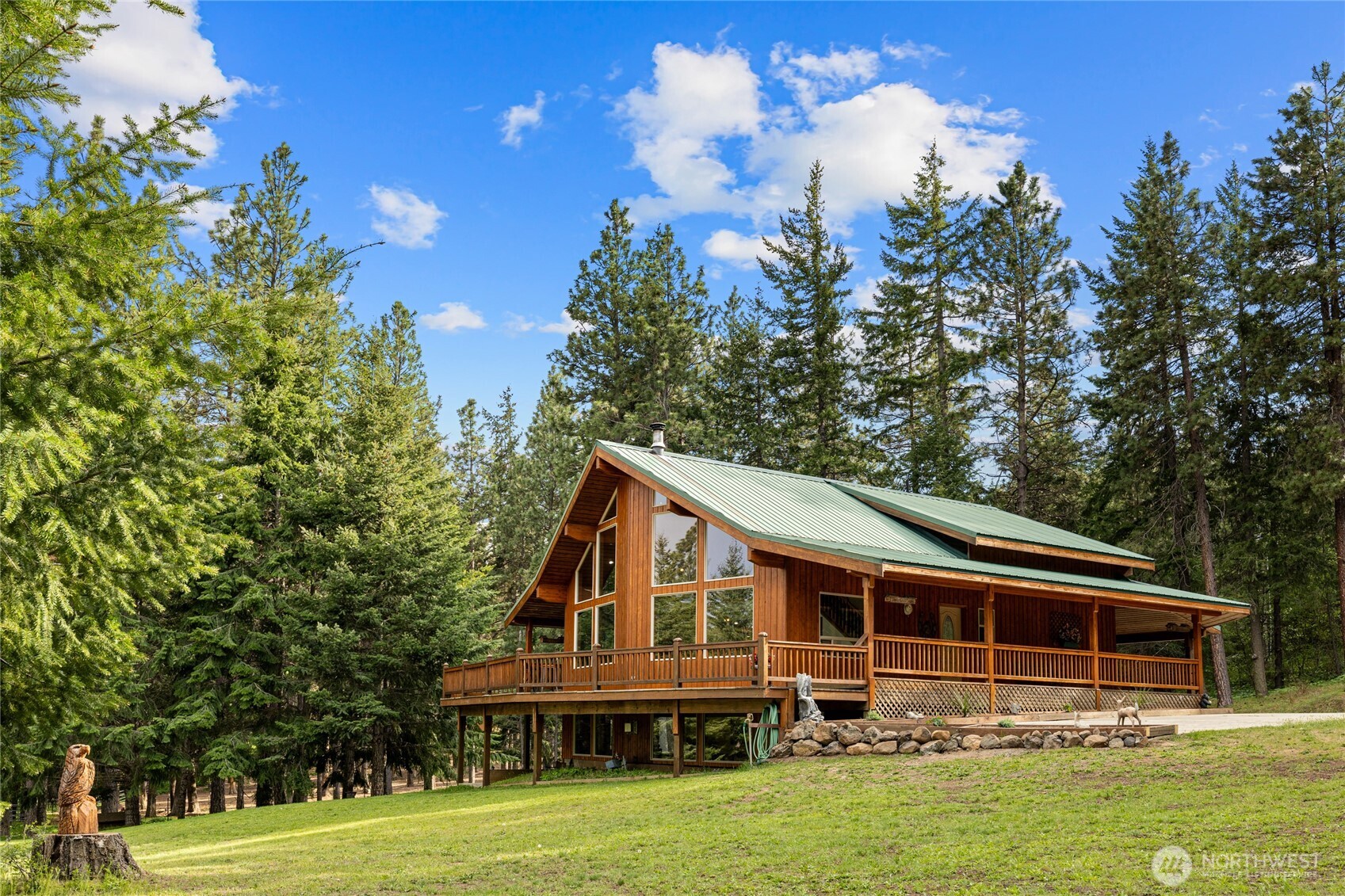 1101 Emerick Road Cle Elum, WA 98922 - Photo 4 of 40 a front view of a house with a yard