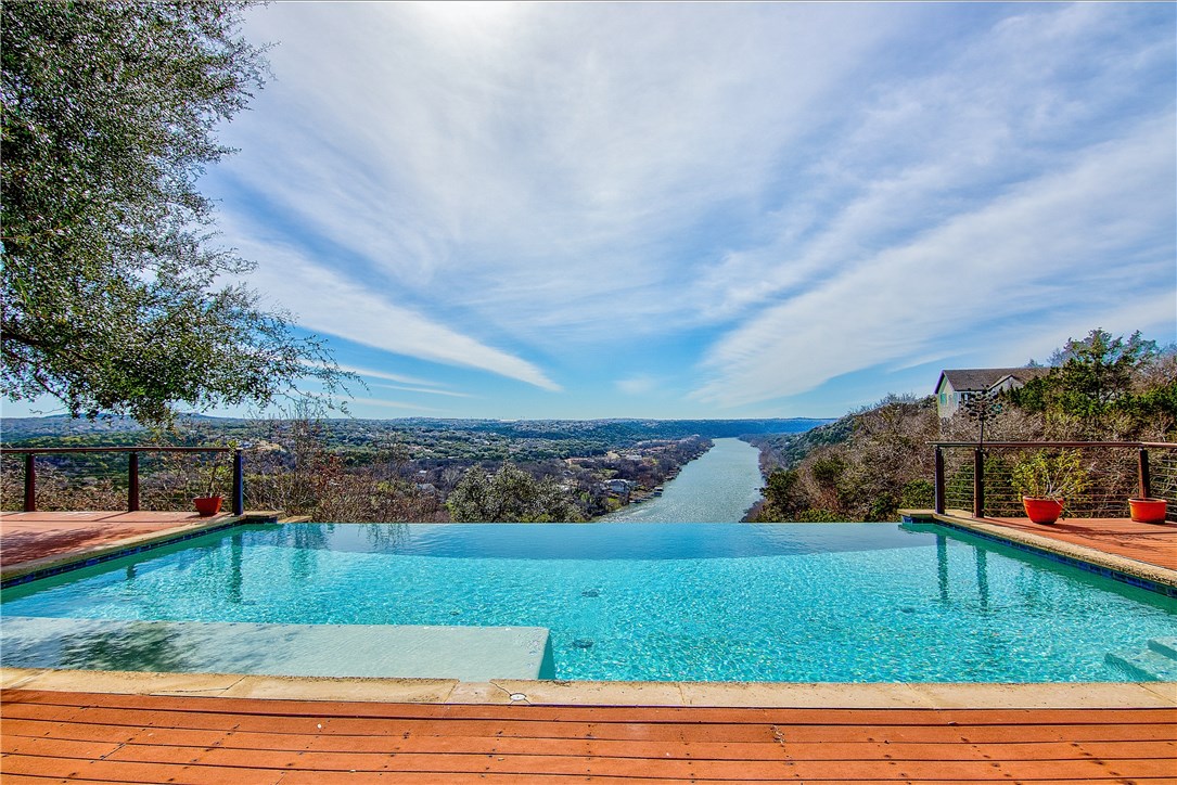 3601 Cloudy Ridge Road Austin, TX 78734 - Photo 1 of 1 Beautifully positioned on 7.58 acres overlooking Lake Austin, this fabulous gated estate is an entertainer's dream!