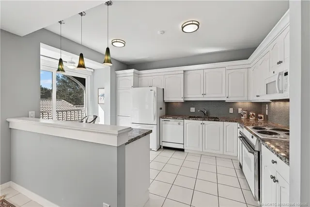 $398,500 | 12416 Harbour Ridge Boulevard, Unit 66, Palm City, FL 34990