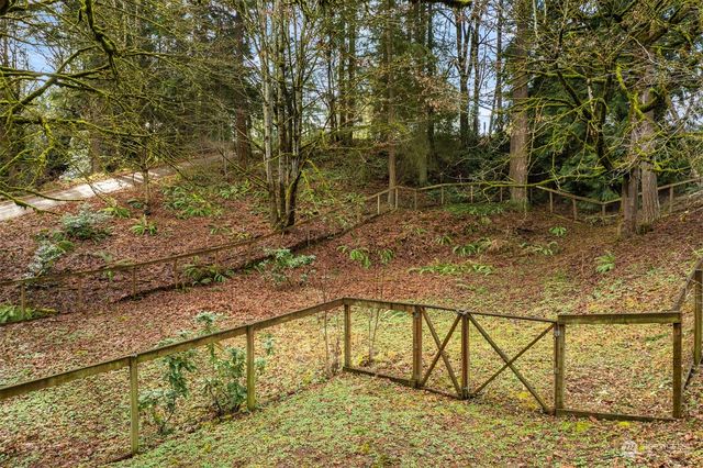 a view of swimming pool with a yard
