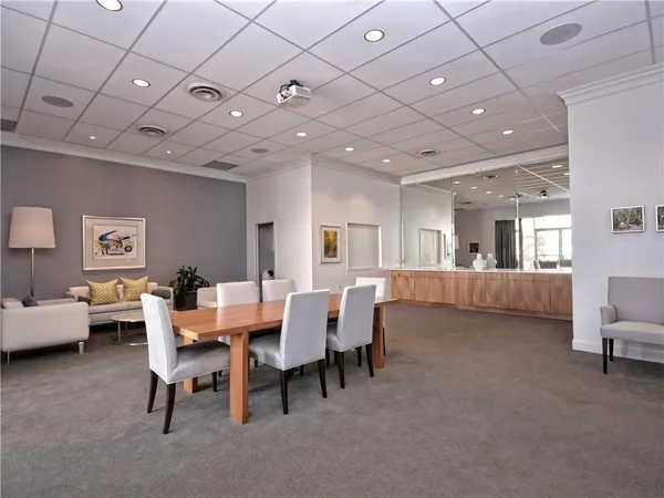 a view of a livingroom with furniture and window