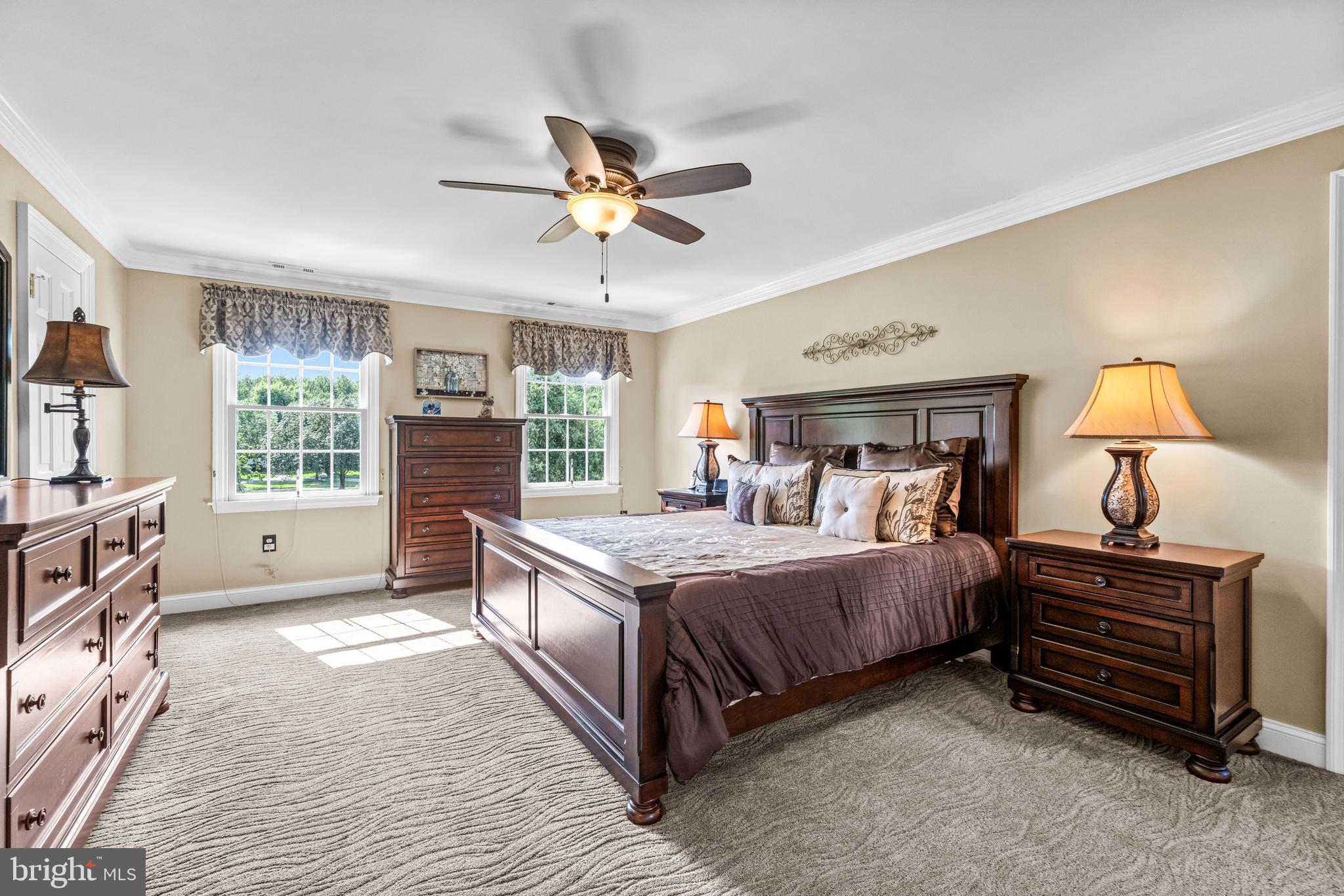 103 Fox Chase Court Southampton, NJ 08088 - Photo 42 of 98 a bed room with a bed and a chandelier