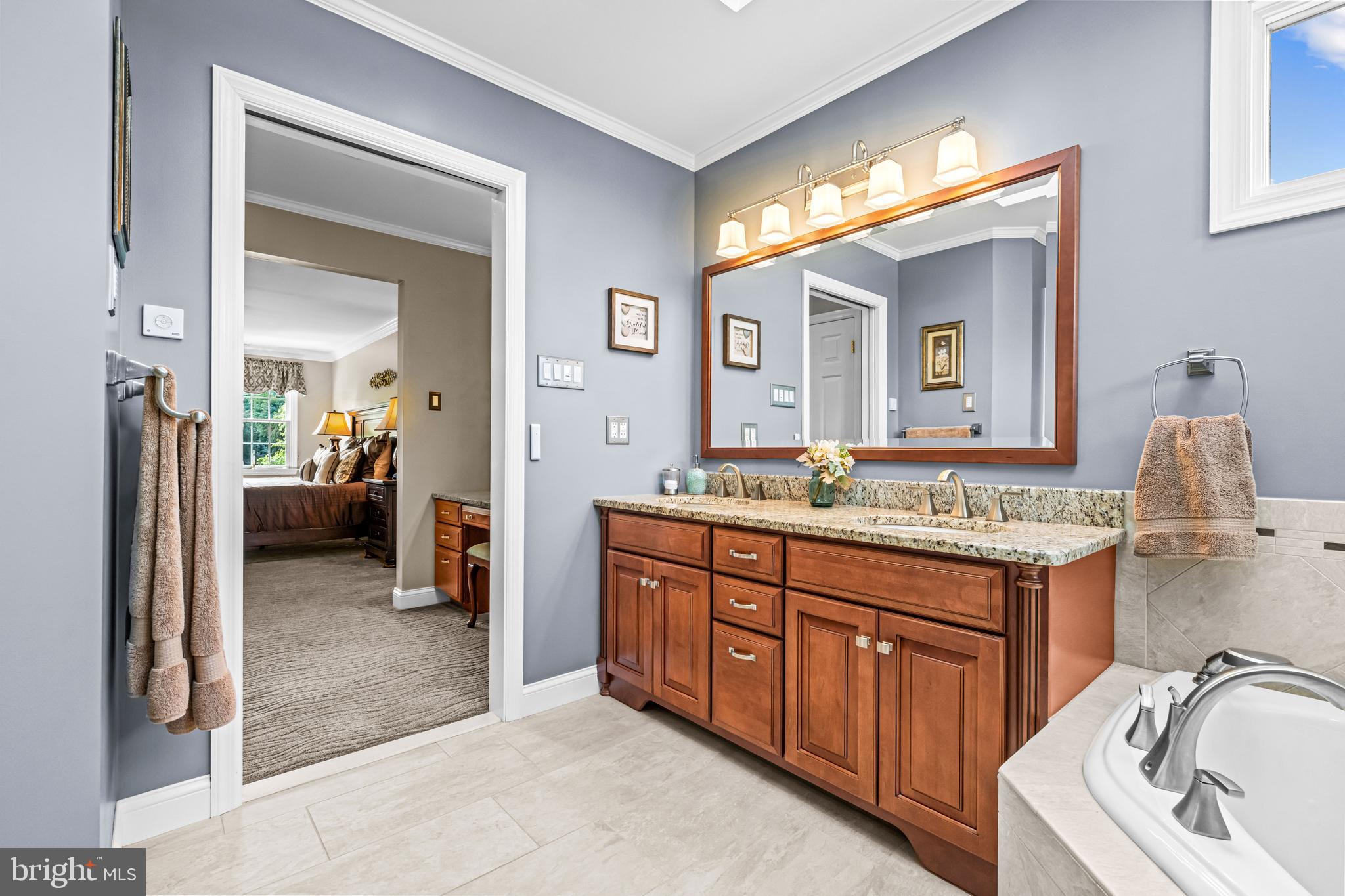 103 Fox Chase Court Southampton, NJ 08088 - Photo 52 of 98 a bathroom with a granite countertop sink and a mirror