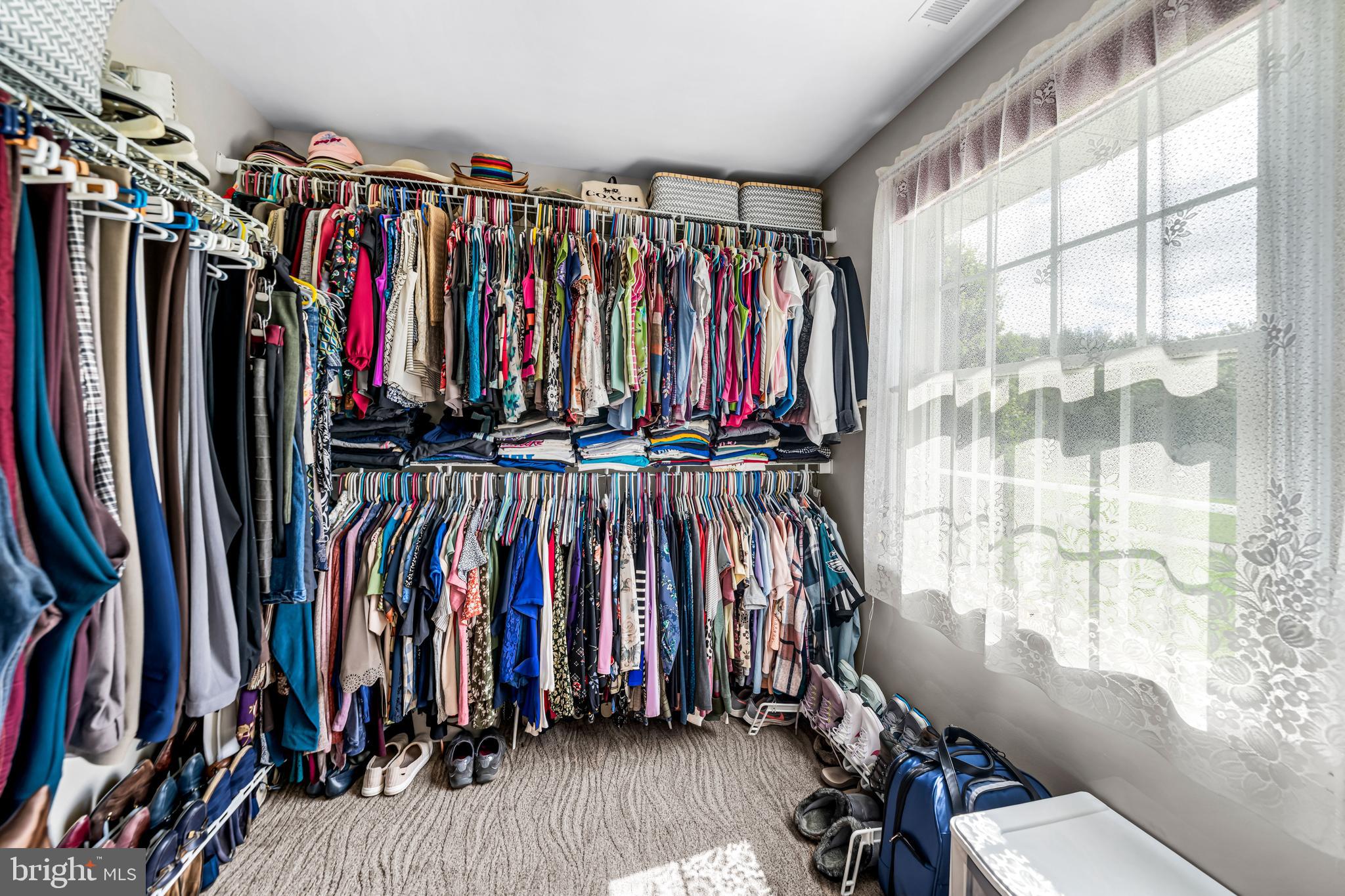 103 Fox Chase Court Southampton, NJ 08088 - Photo 54 of 98 a view of walk in closet with clothes
