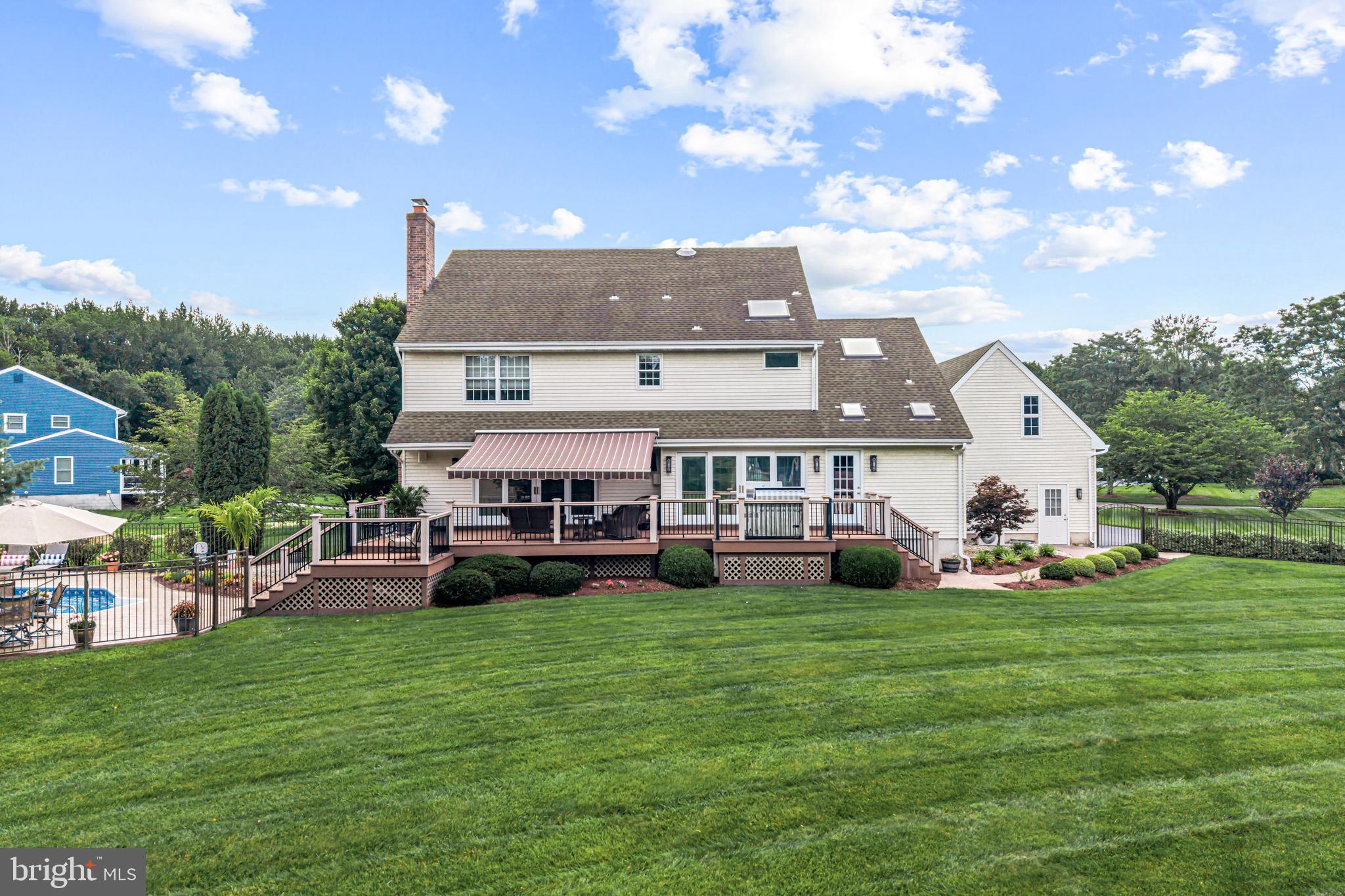 103 Fox Chase Court Southampton, NJ 08088 - Photo 77 of 98 a view of a house with sitting area and garden
