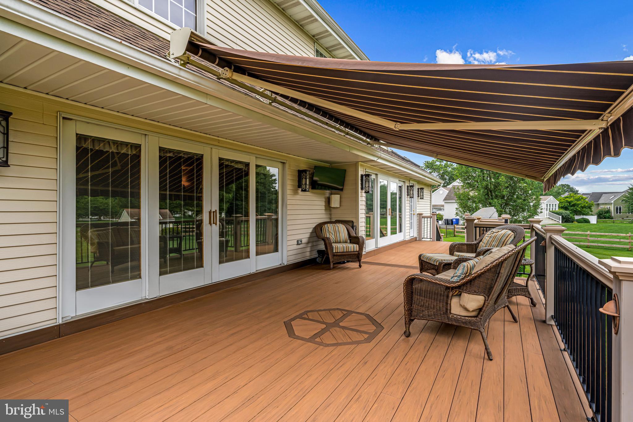 103 Fox Chase Court Southampton, NJ 08088 - Photo 92 of 98 a view of a patio with table and chairs and wooden floor