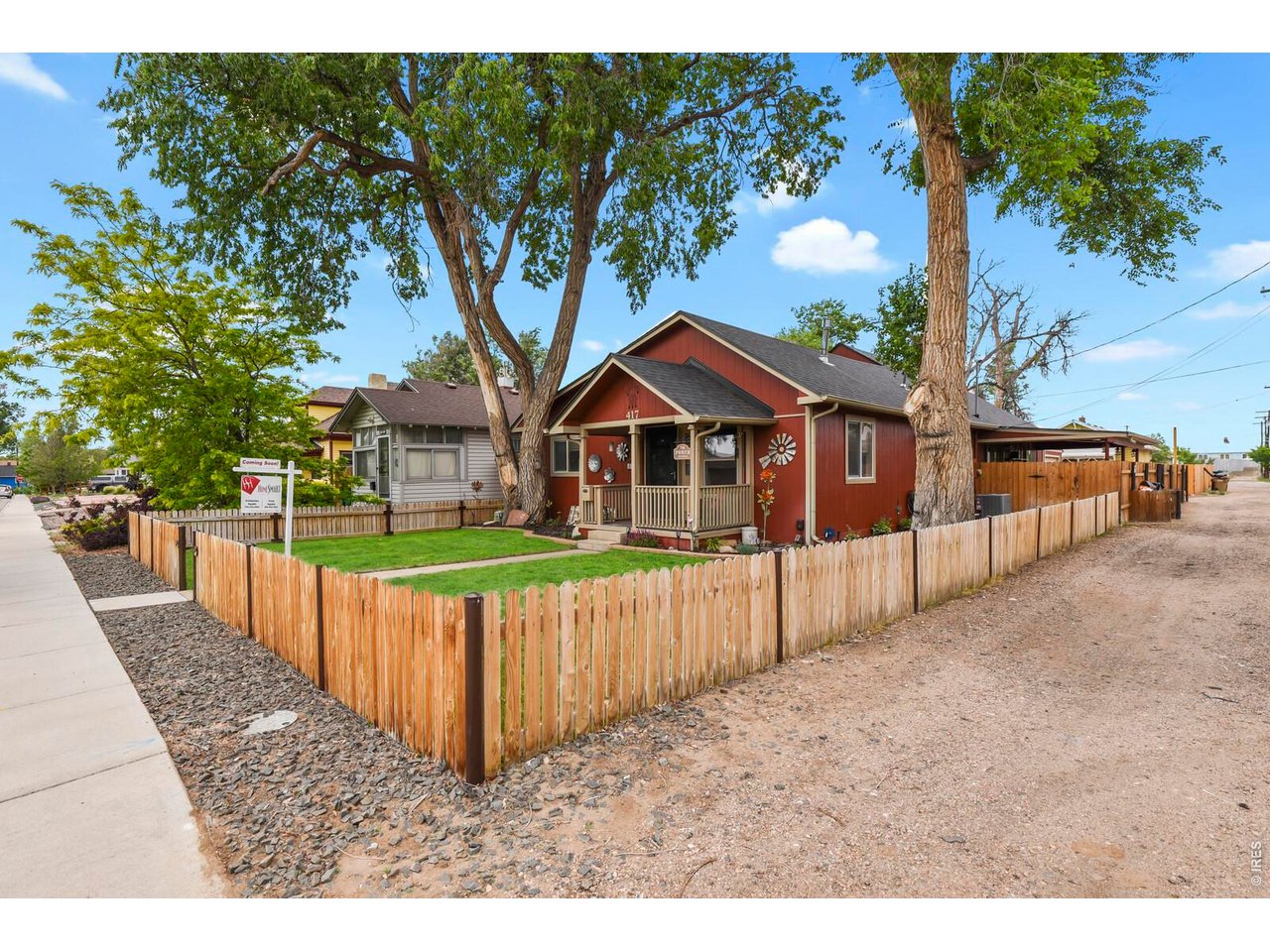 417 2nd Street Fort Lupton, CO 80621 - Photo 2 of 24 a view of house with a yard