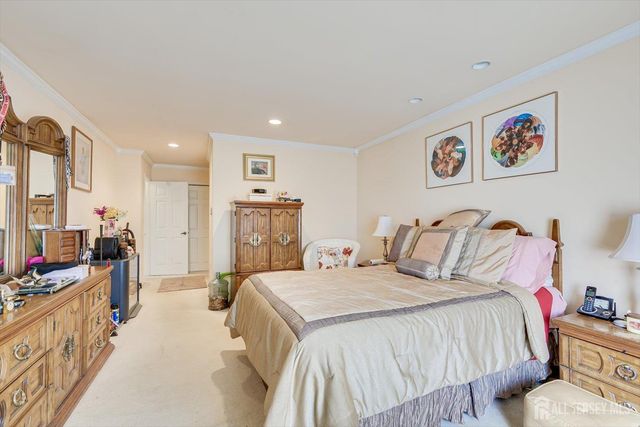 a bathroom with a sink vanity granite tub and shower