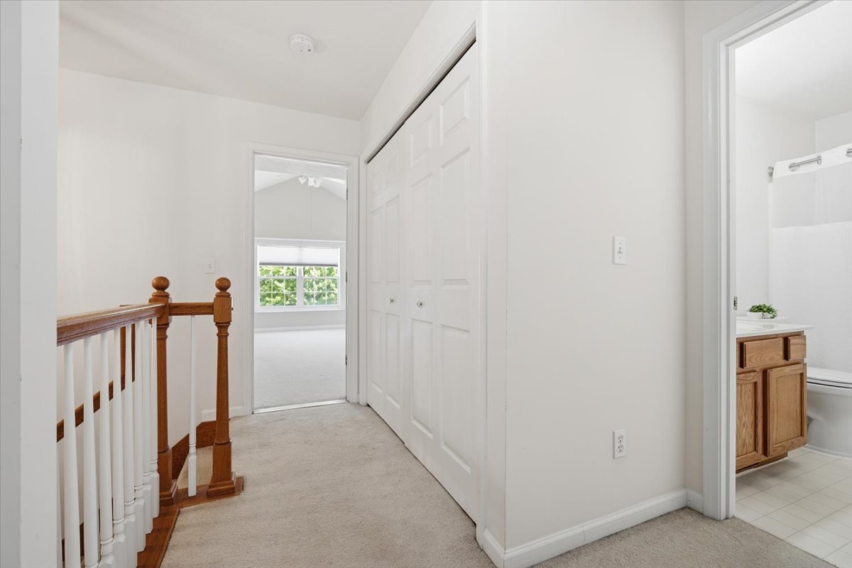 311 Old Farm Road Bloomington, IL 61704 - Photo 16 of 34 a view of a hallway with closet