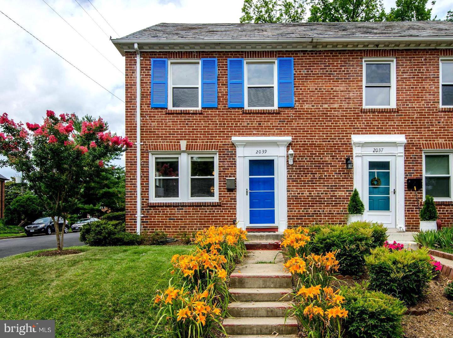 2039 20th Road North Arlington, VA 22201 - Photo 1 of 1 a front view of a house with a yard