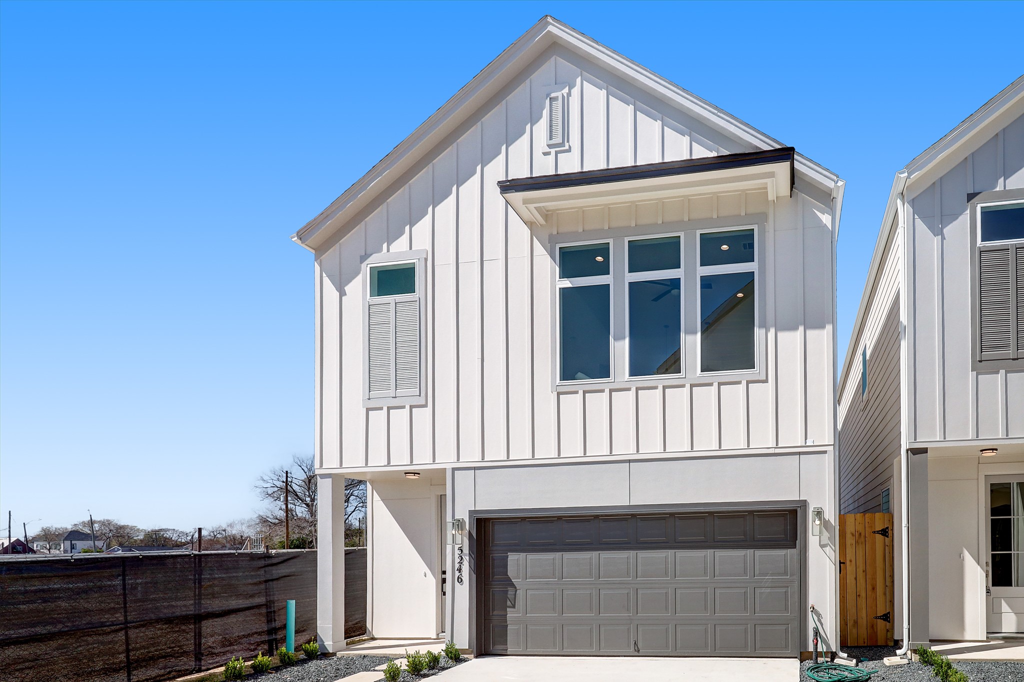 5242 Texas Street Houston, TX 77011 - Photo 2 of 27 a front view of a house with a yard