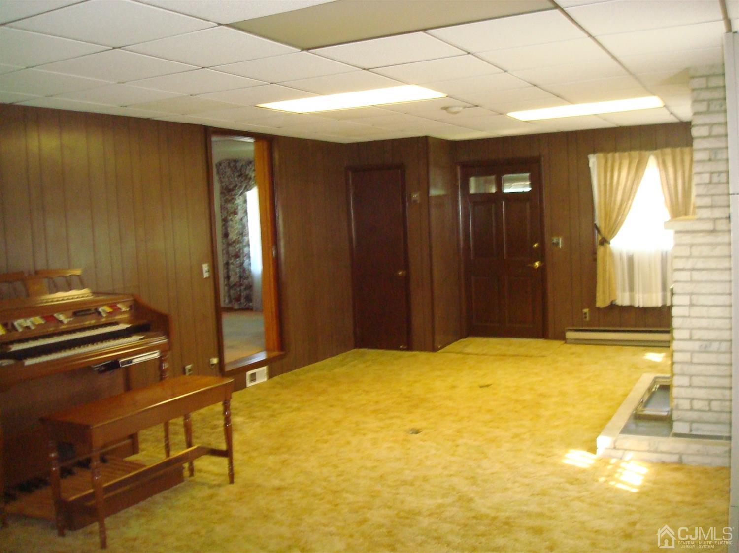 7 James Road East Brunswick, NJ 08816 - Photo 11 of 21 a view of an empty room with windows