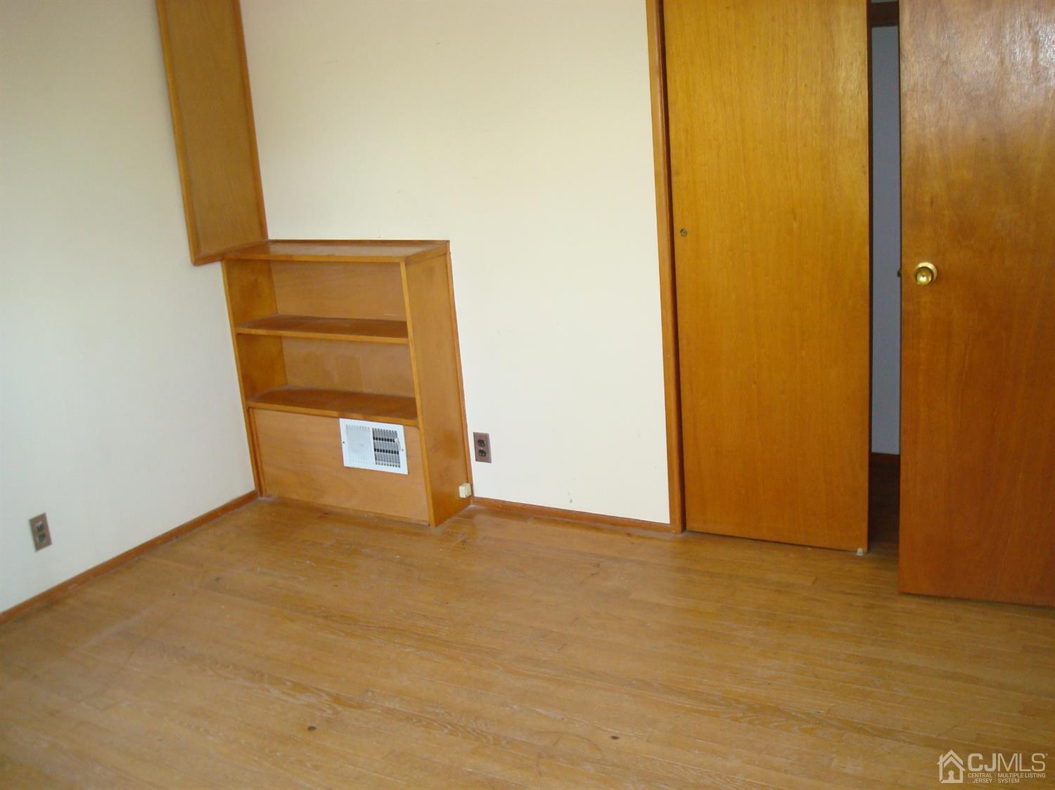 7 James Road East Brunswick, NJ 08816 - Photo 14 of 21 a view of an empty room and fire place