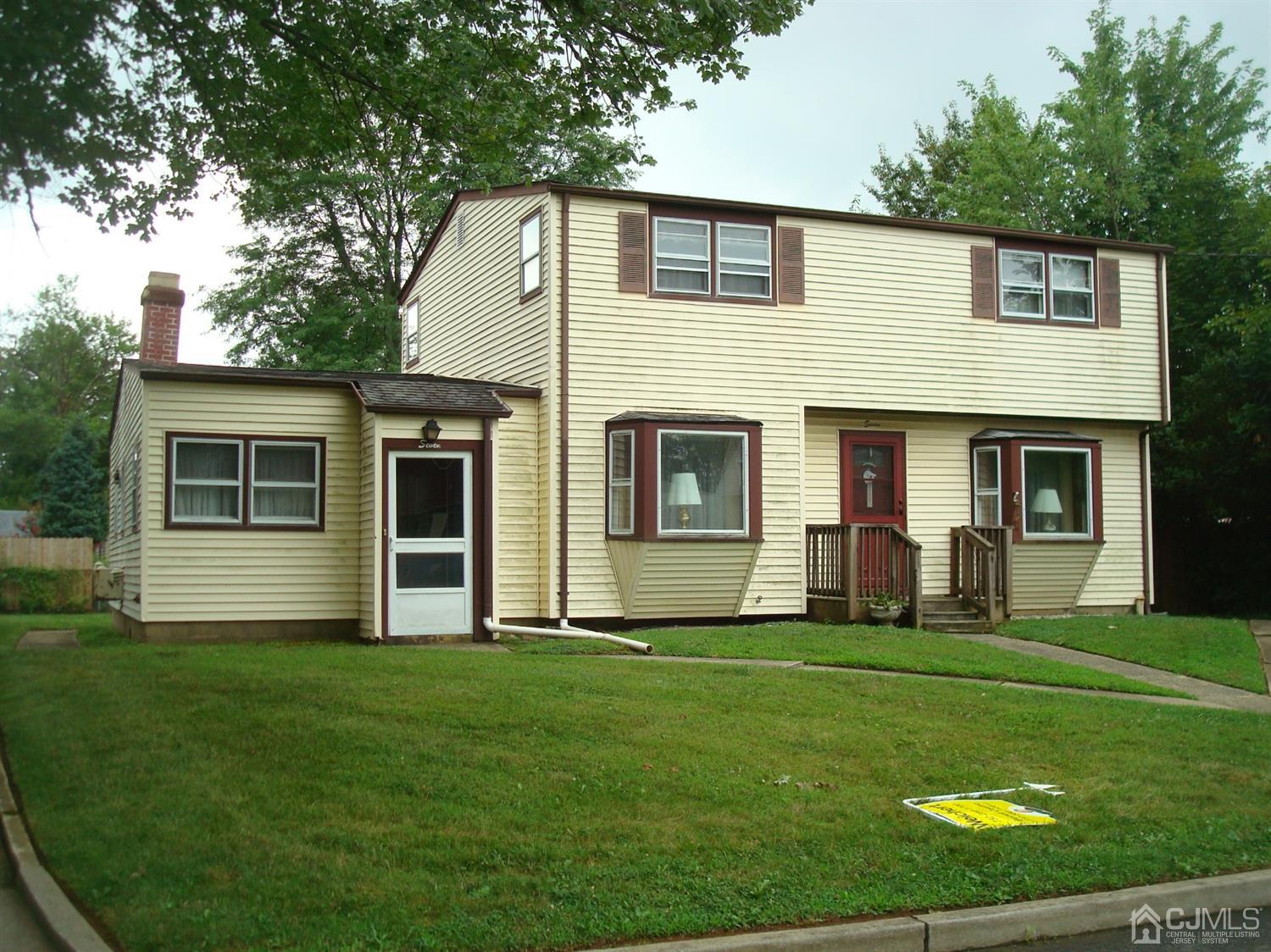 7 James Road East Brunswick, NJ 08816 - Photo 21 of 21 a front view of a house with a yard