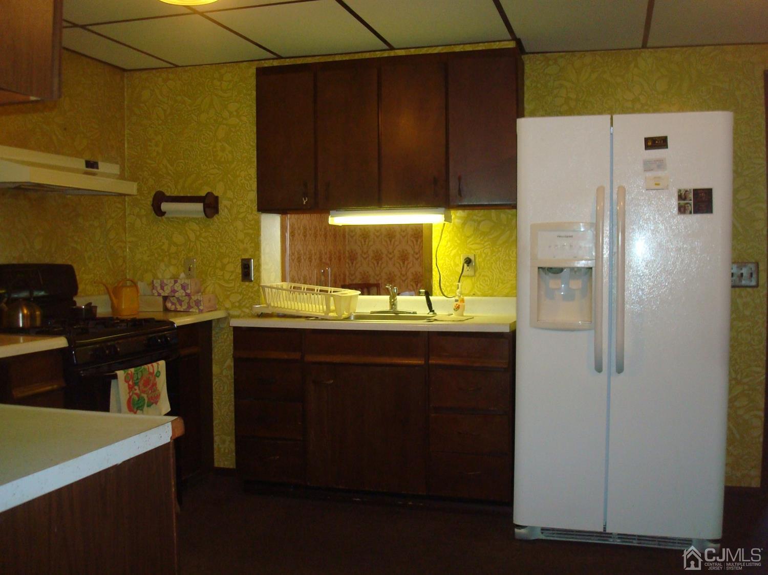 7 James Road East Brunswick, NJ 08816 - Photo 4 of 21 a bathroom with a sink and a mirror