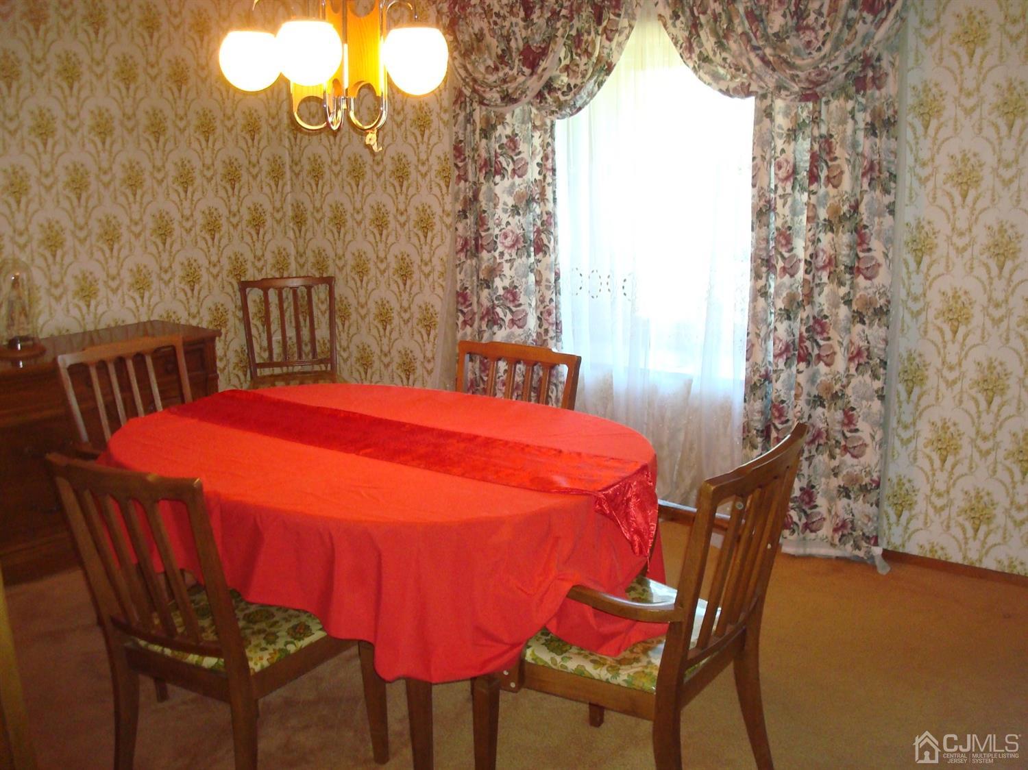 7 James Road East Brunswick, NJ 08816 - Photo 5 of 21 a dining room with furniture and wooden floor