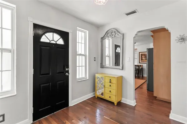 a view of livingroom with furniture and wooden floor