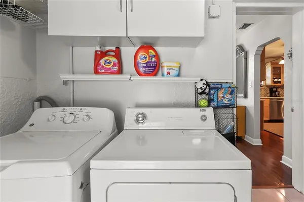 a utility room with dryer and washer
