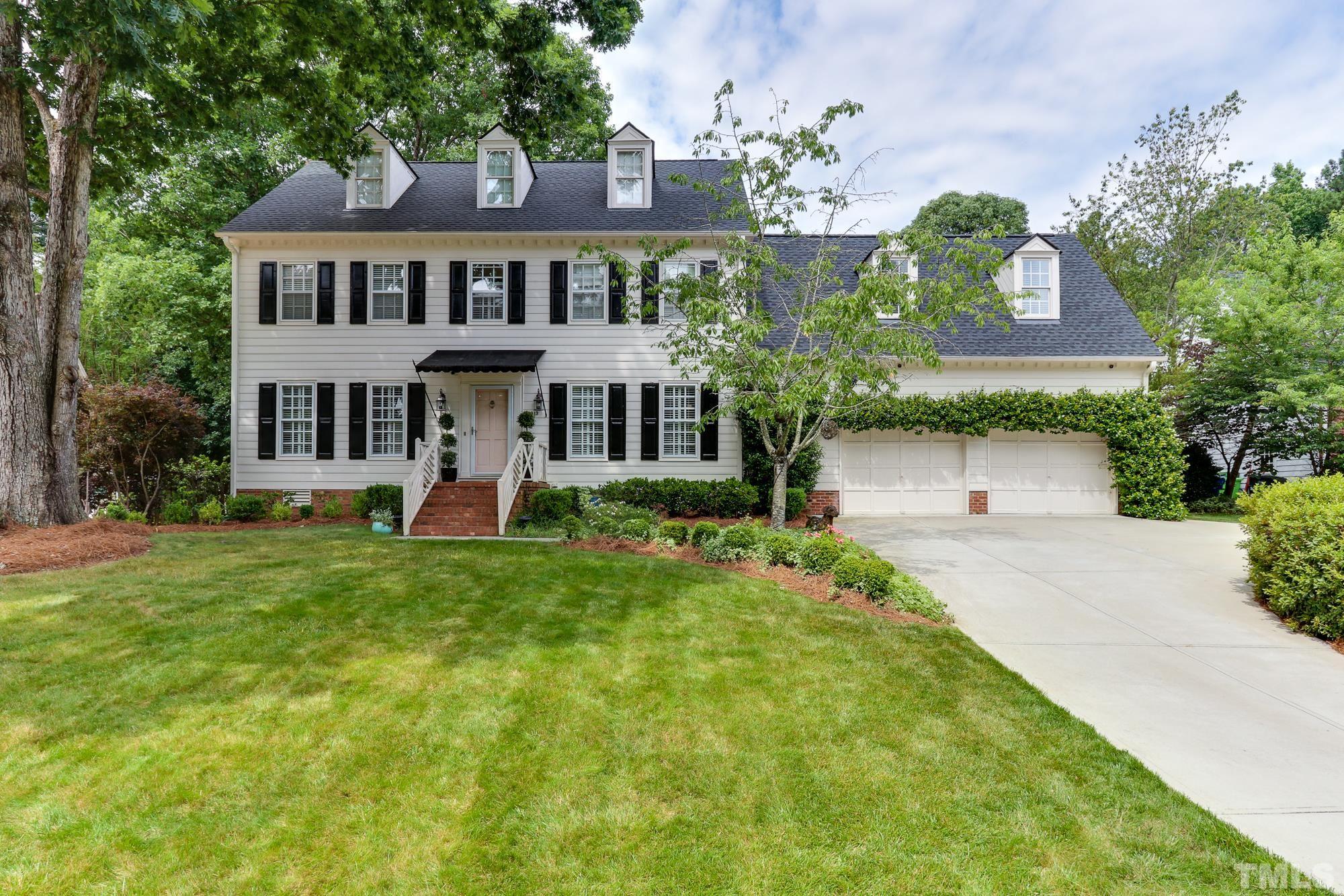 8913 Lindenshire Road Raleigh, NC 27615 - Photo 1 of 27 front view of a house with a yard