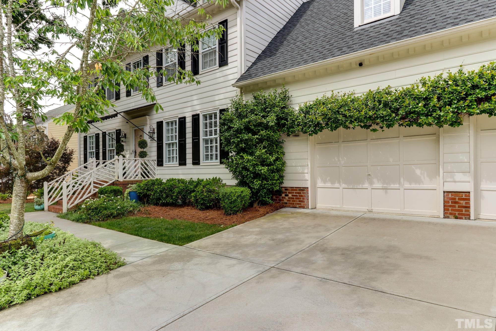 8913 Lindenshire Road Raleigh, NC 27615 - Photo 2 of 27 front view of a house with a yard