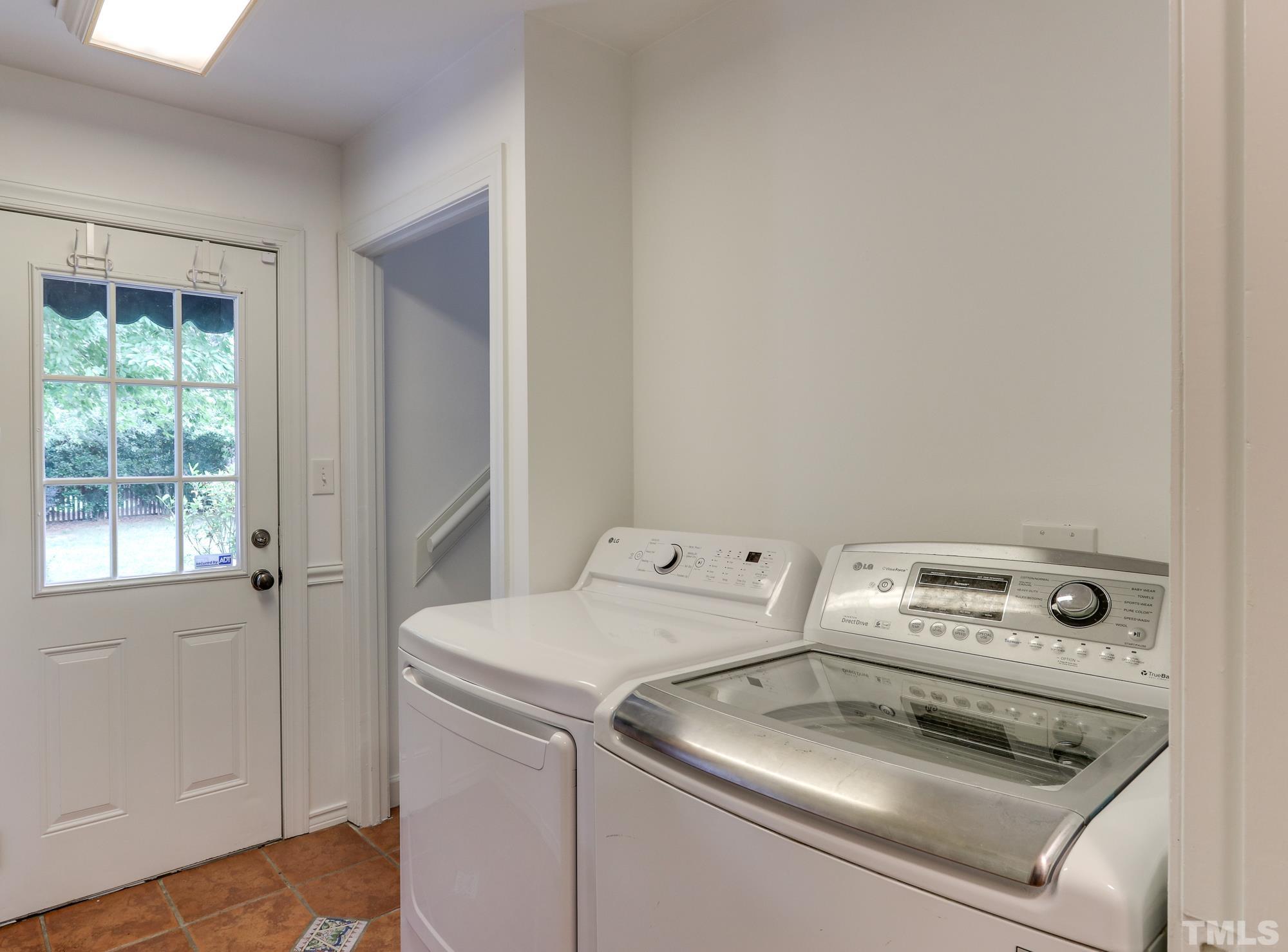 8913 Lindenshire Road Raleigh, NC 27615 - Photo 22 of 27 a utility room with dryer and washer