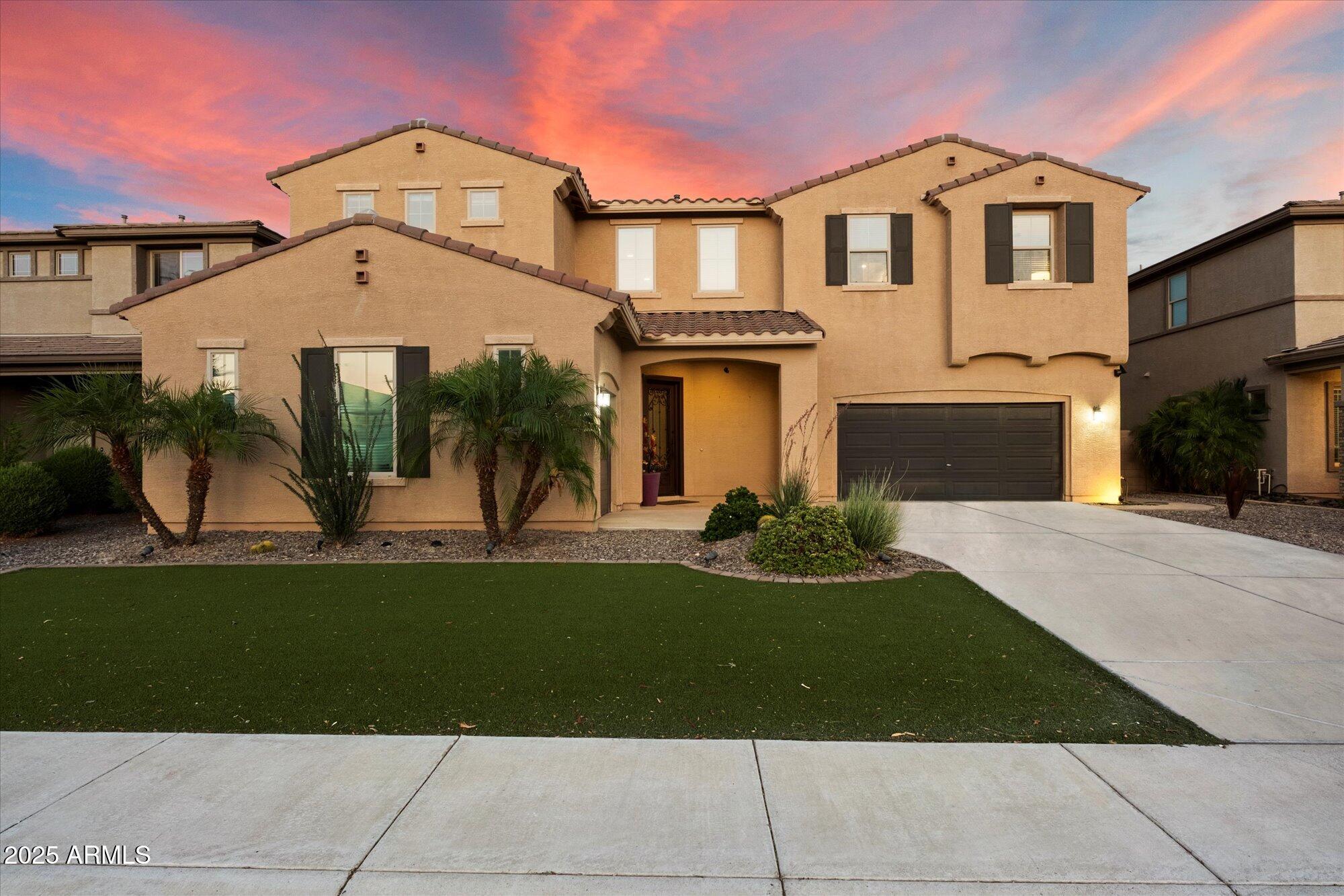 5123 South Mariposa Drive Gilbert, AZ 85298 - Photo 1 of 35 a front view of a house with garden