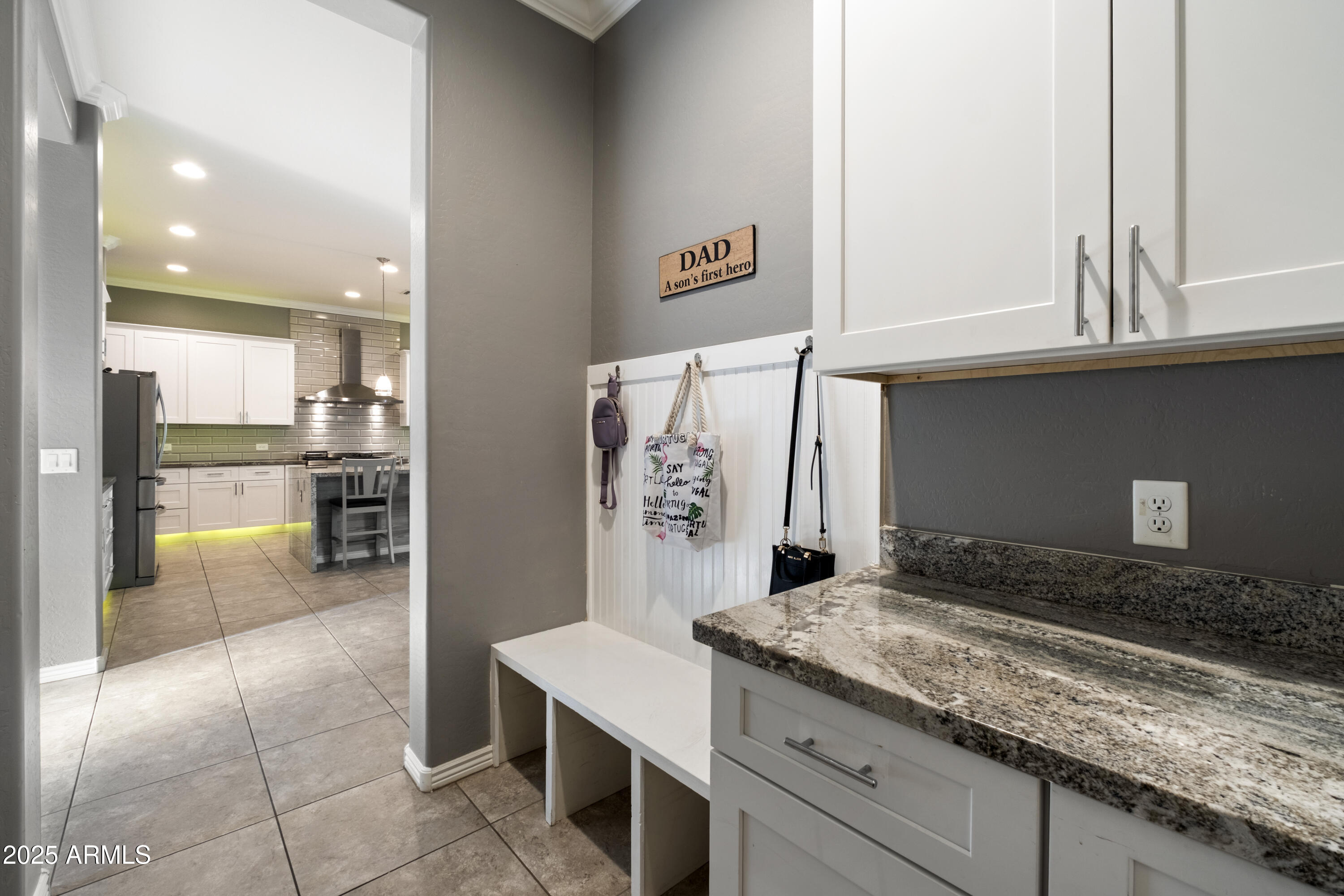 5123 South Mariposa Drive Gilbert, AZ 85298 - Photo 13 of 35 a kitchen with a sink and cabinets