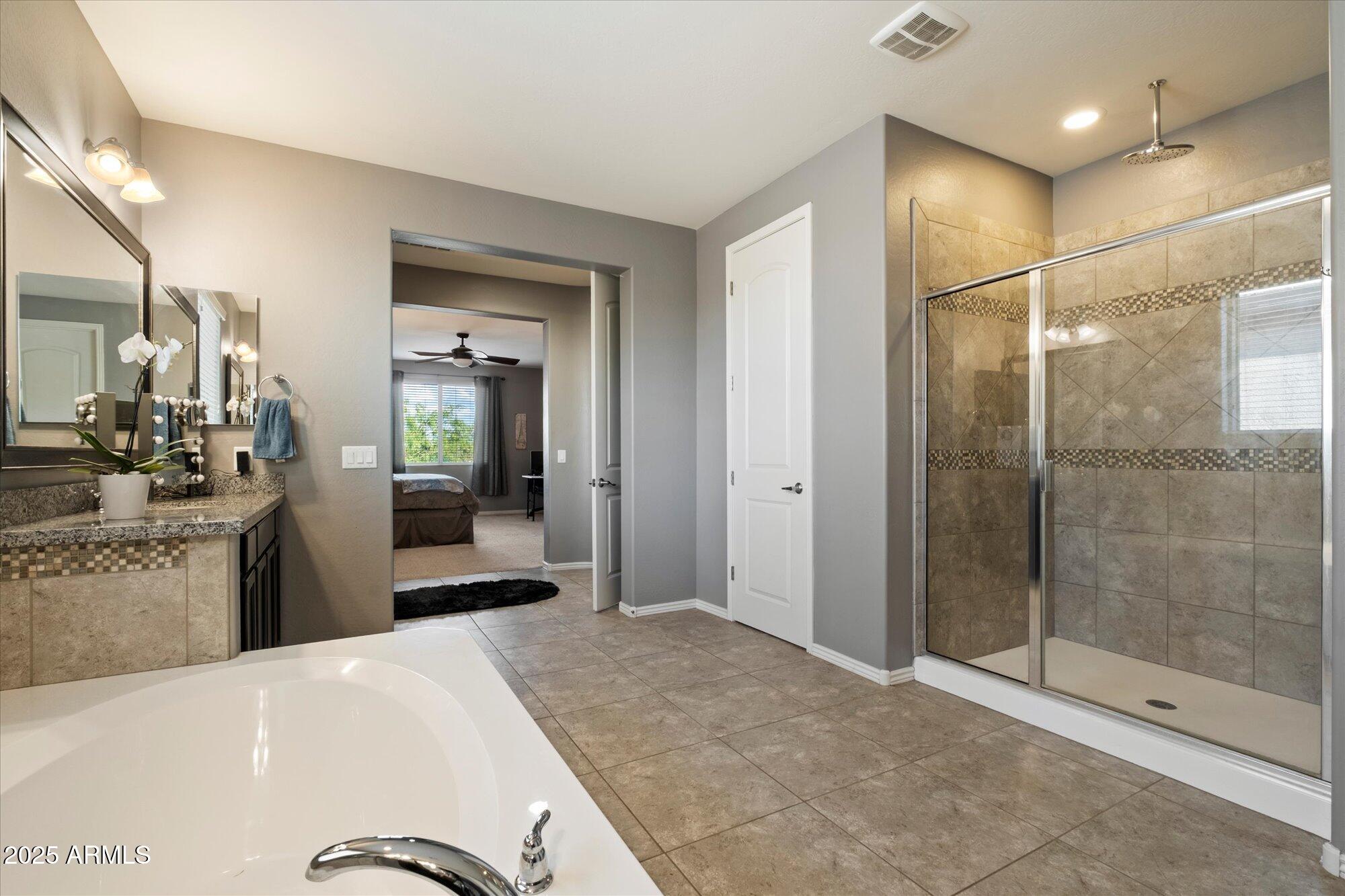 5123 South Mariposa Drive Gilbert, AZ 85298 - Photo 17 of 35 a kitchen with a refrigerator and a sink