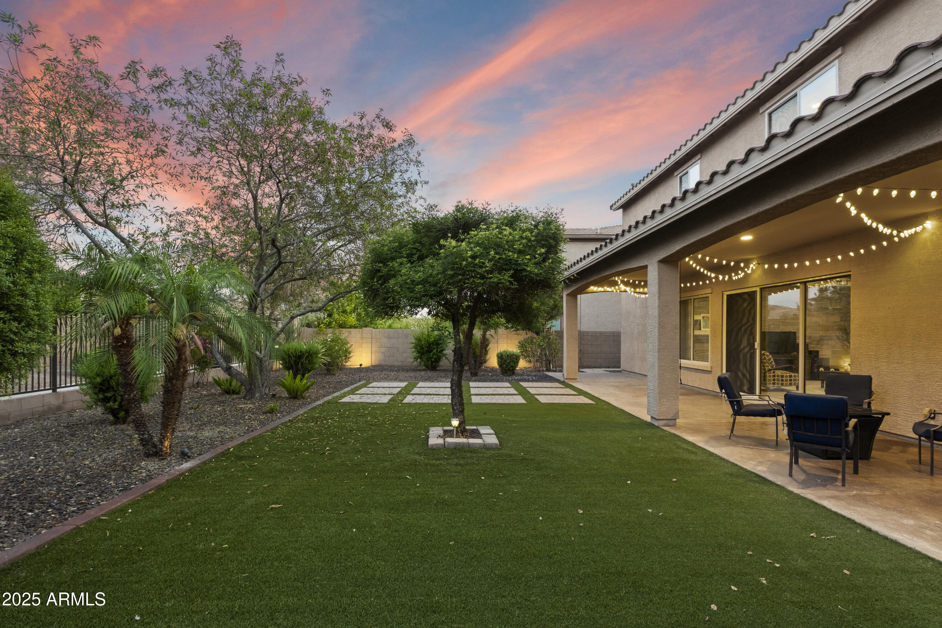 5123 South Mariposa Drive Gilbert, AZ 85298 - Photo 29 of 35 a swimming pool with outdoor seating and yard
