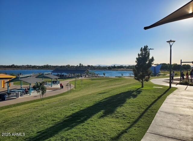 5123 South Mariposa Drive Gilbert, AZ 85298 - Photo 32 of 35 a view of a lake with a yard and a large window