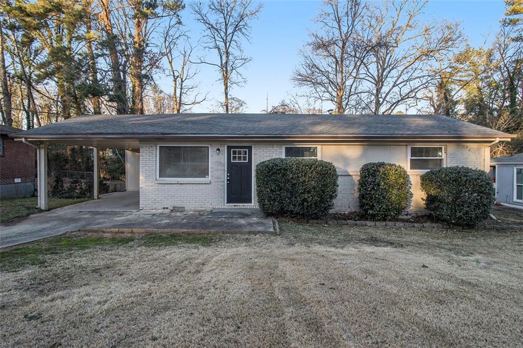 1943 Glenmar Drive Decatur, GA 30032 - Photo 1 of 1 a view of a house with a yard and large tree