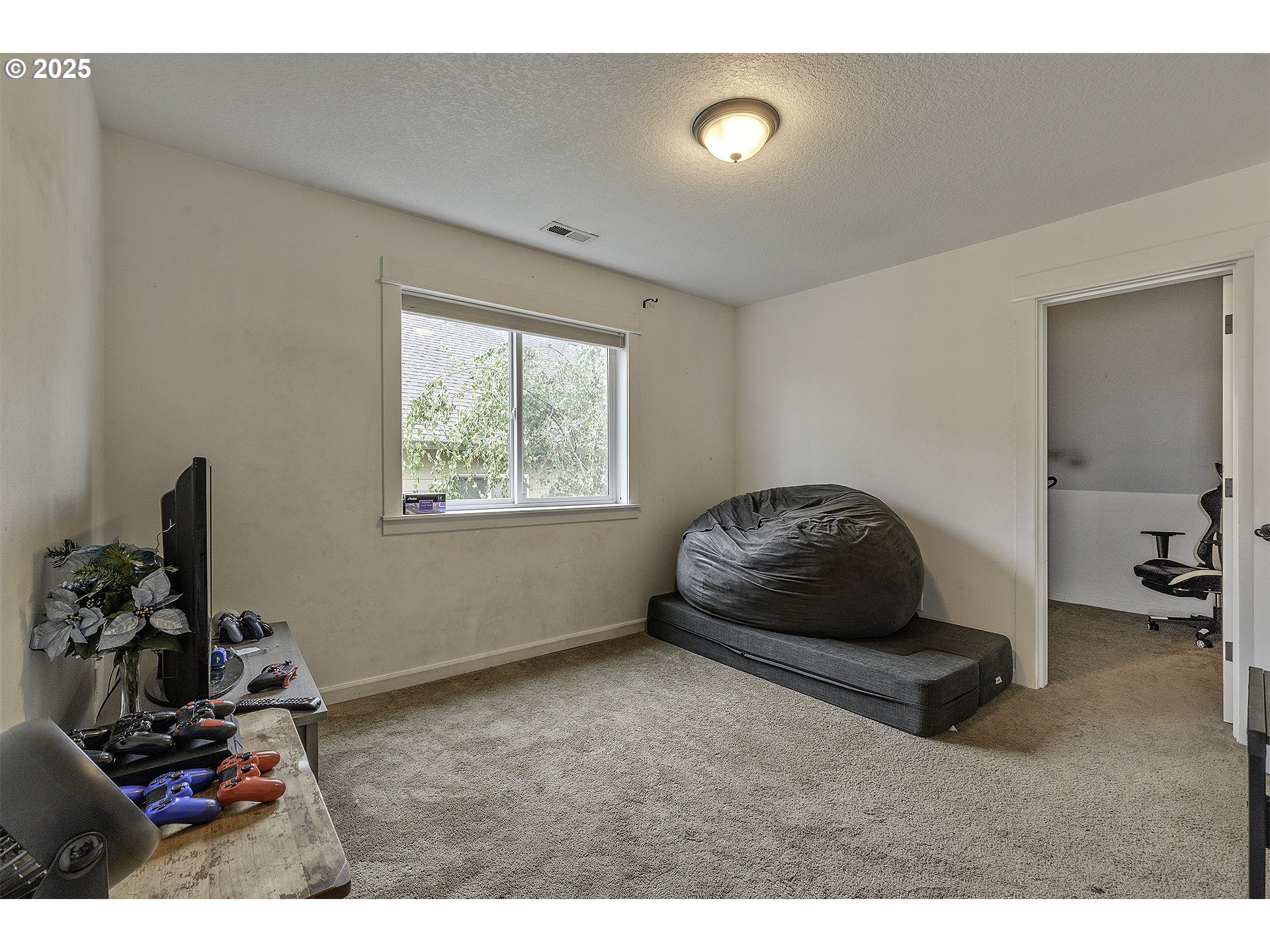 35505 Iris Way St. Helens, OR 97051 - Photo 11 of 17 a living room with furniture and a window