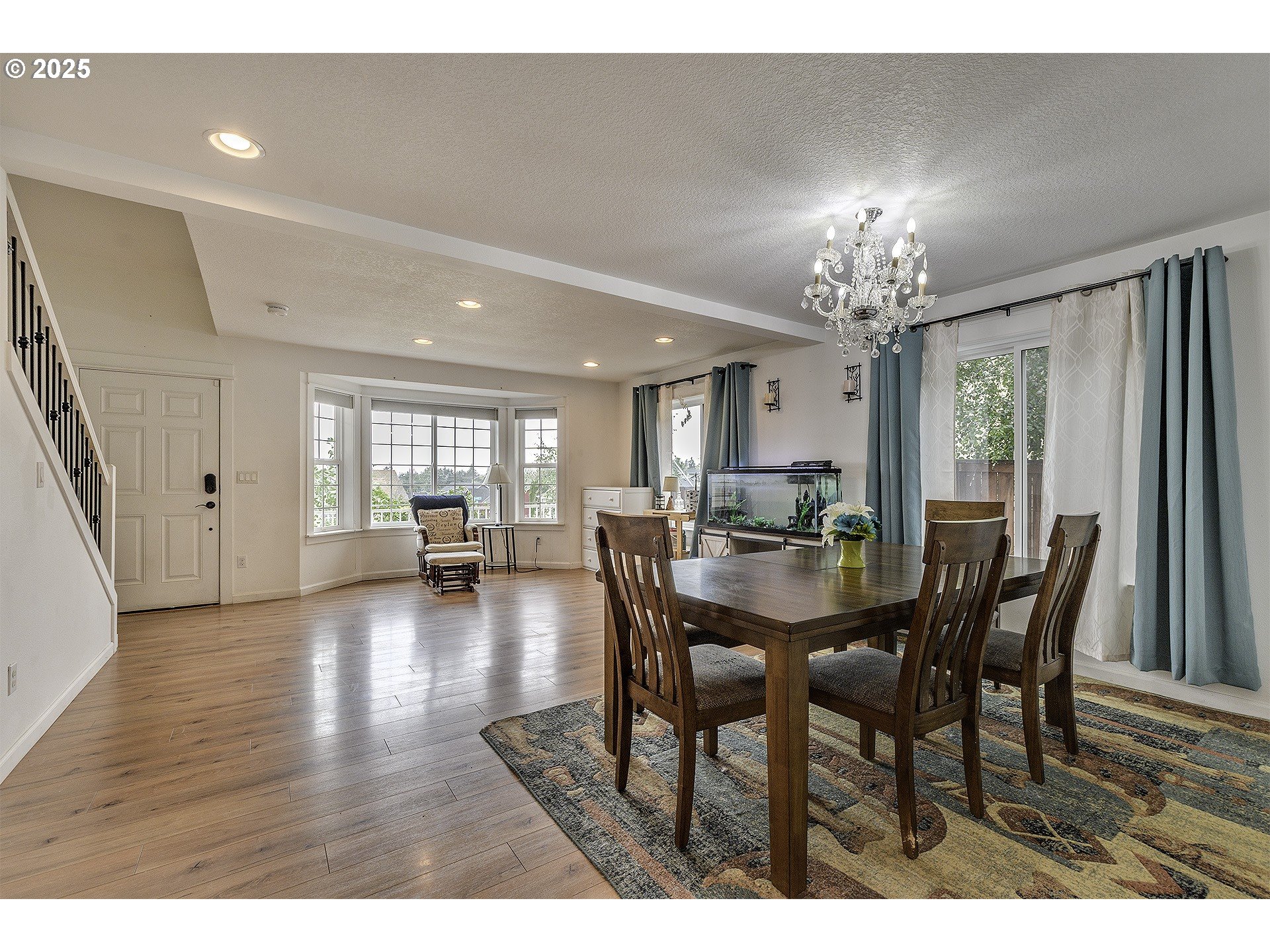 35505 Iris Way St. Helens, OR 97051 - Photo 2 of 17 a view of a dining room with furniture and wooden floor