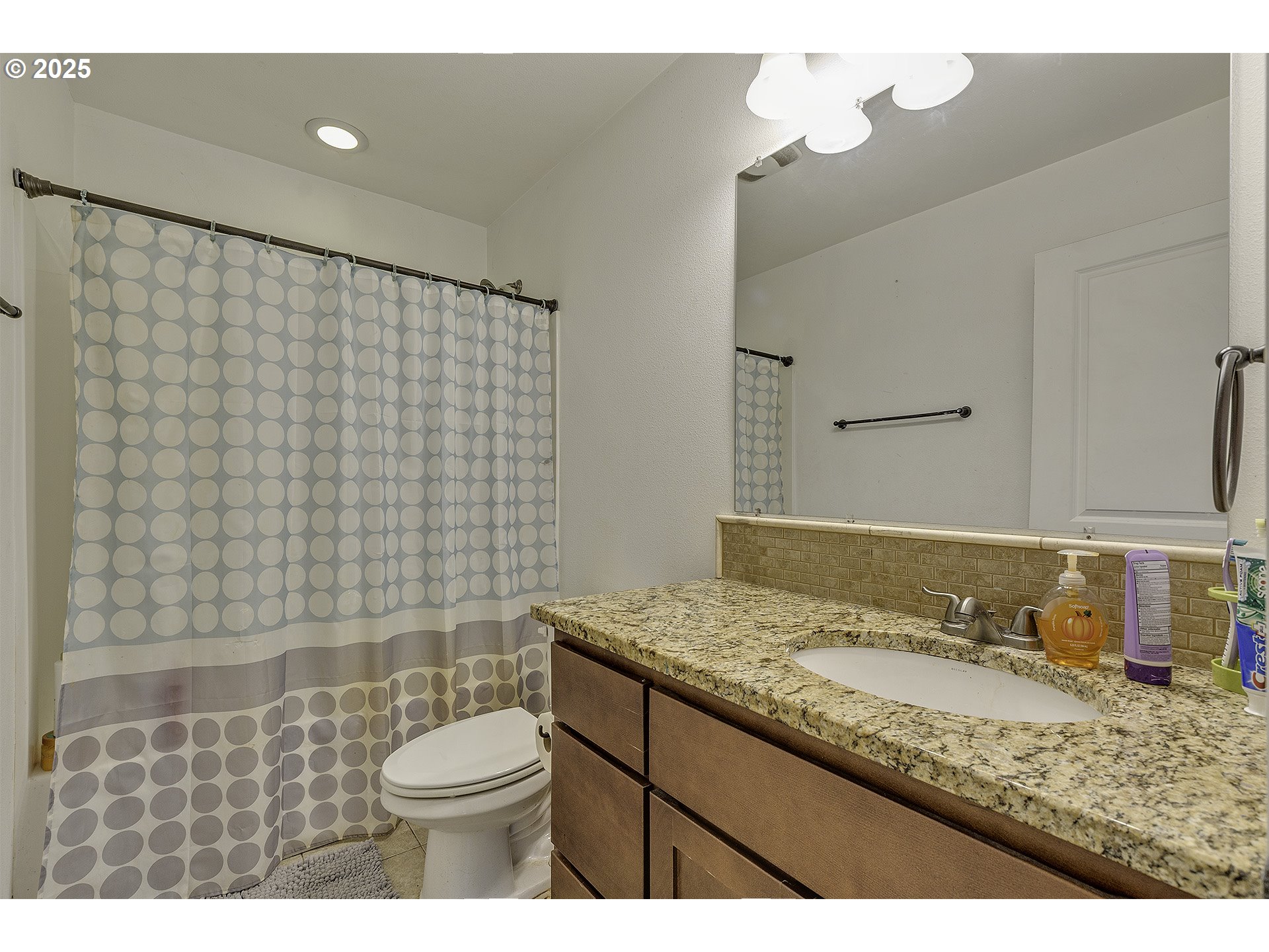 35505 Iris Way St. Helens, OR 97051 - Photo 8 of 17 a bathroom with a granite countertop sink toilet and shower