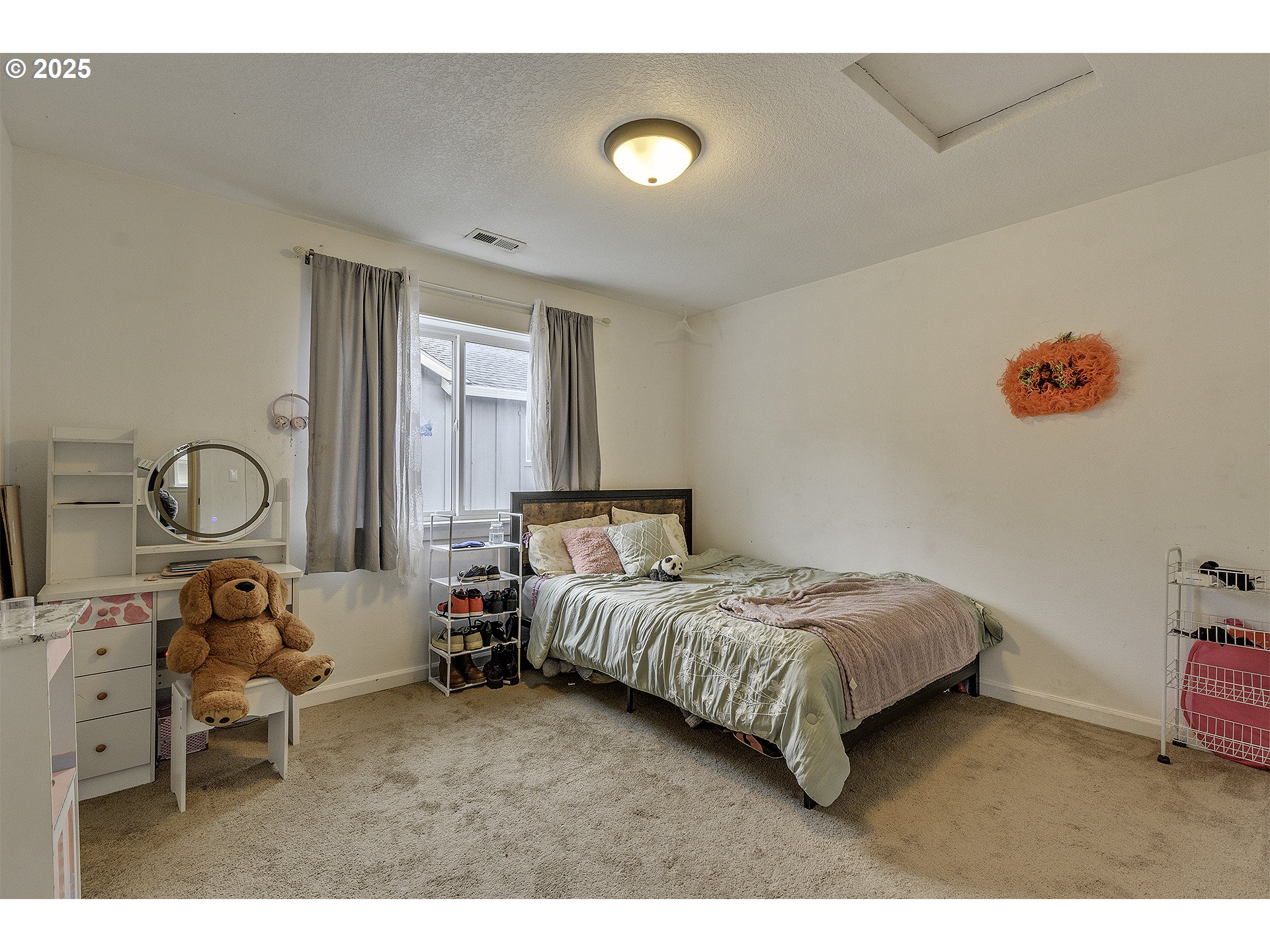 35505 Iris Way St. Helens, OR 97051 - Photo 10 of 17 a living room with a bed furniture and a window
