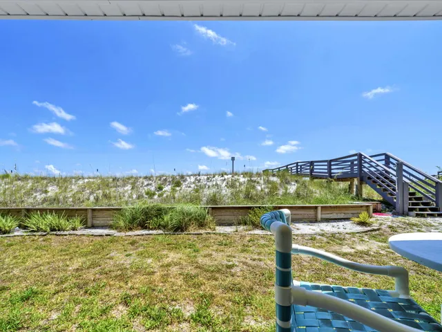 a view of a balcony with an ocean view