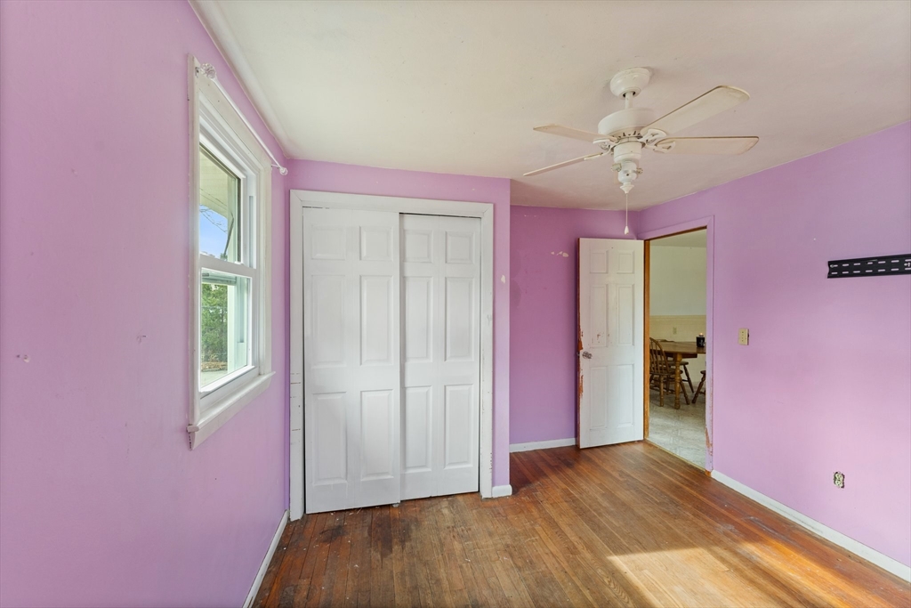 38 Orton Street Worcester, MA 01604 - Photo 13 of 37 wooden floor in an empty room with a window