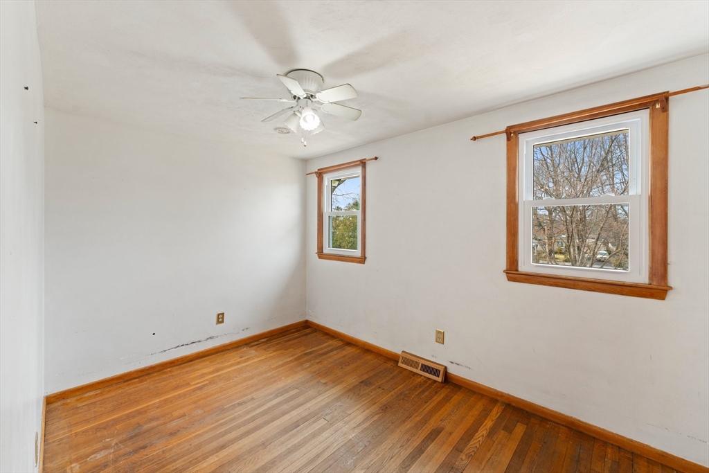 38 Orton Street Worcester, MA 01604 - Photo 19 of 37 a view of a room with wooden floor and a ceiling fan