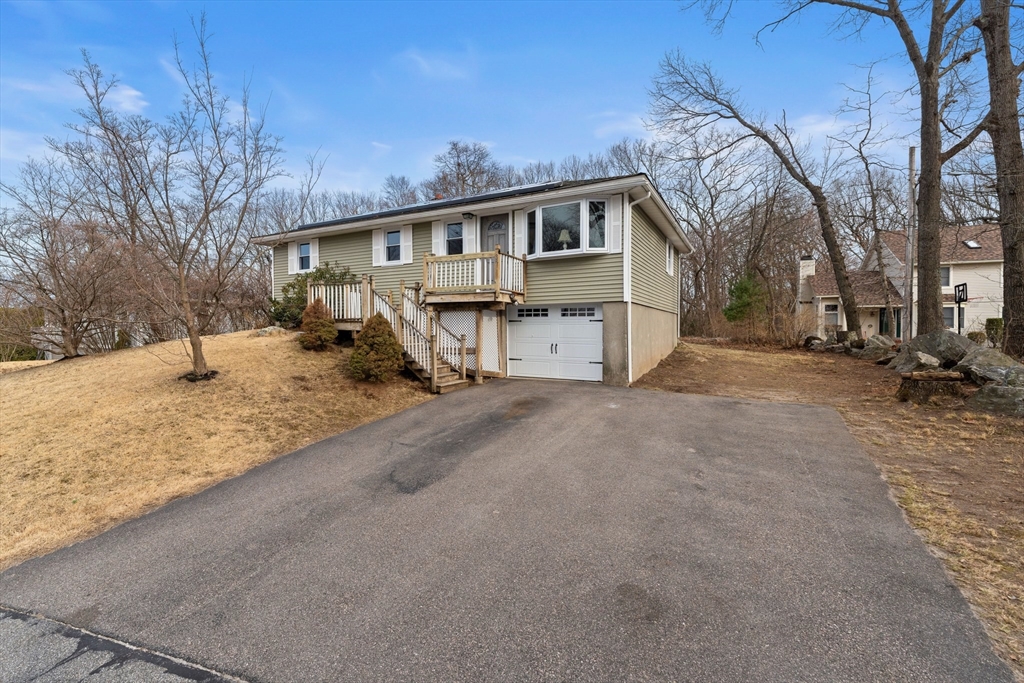 38 Orton Street Worcester, MA 01604 - Photo 26 of 37 a view of a house with a snow in the yard