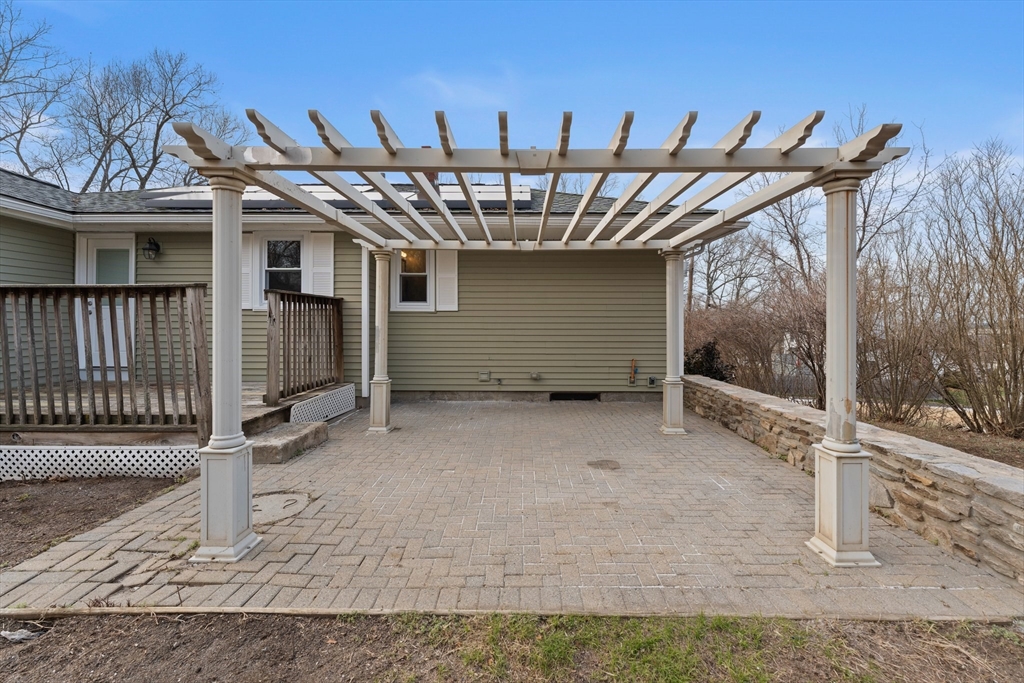 38 Orton Street Worcester, MA 01604 - Photo 31 of 37 a view of a house with a bath tub and wooden fence