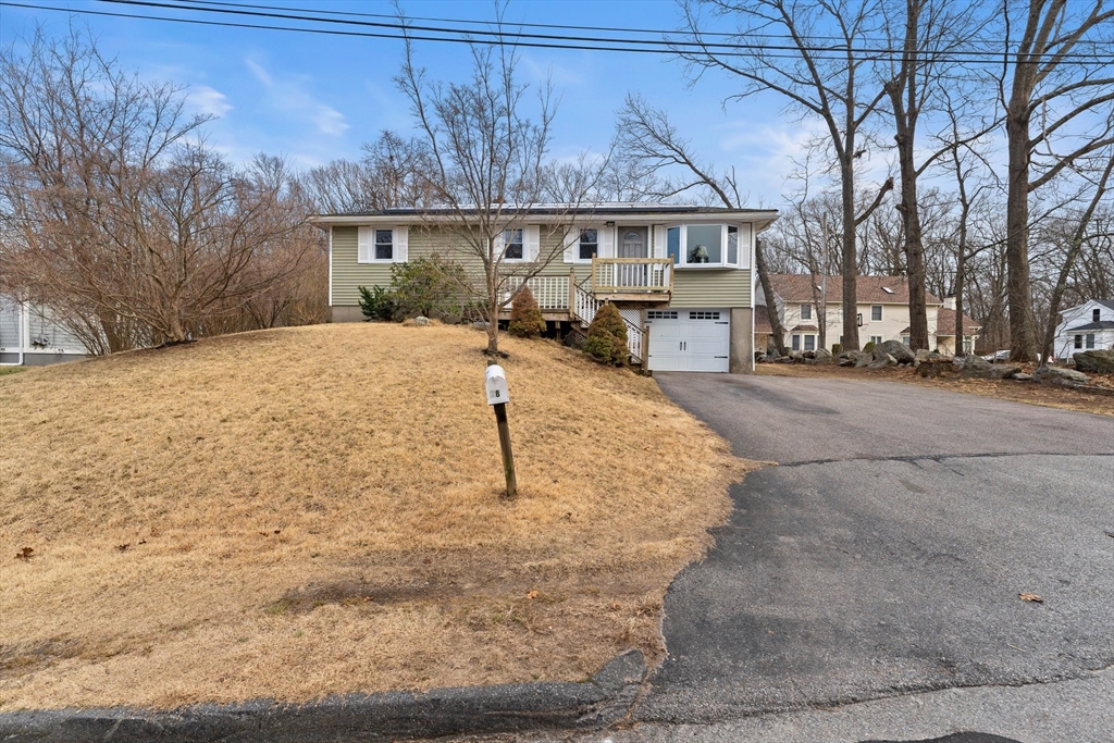 38 Orton Street Worcester, MA 01604 - Photo 37 of 37 a front view of a house with a yard