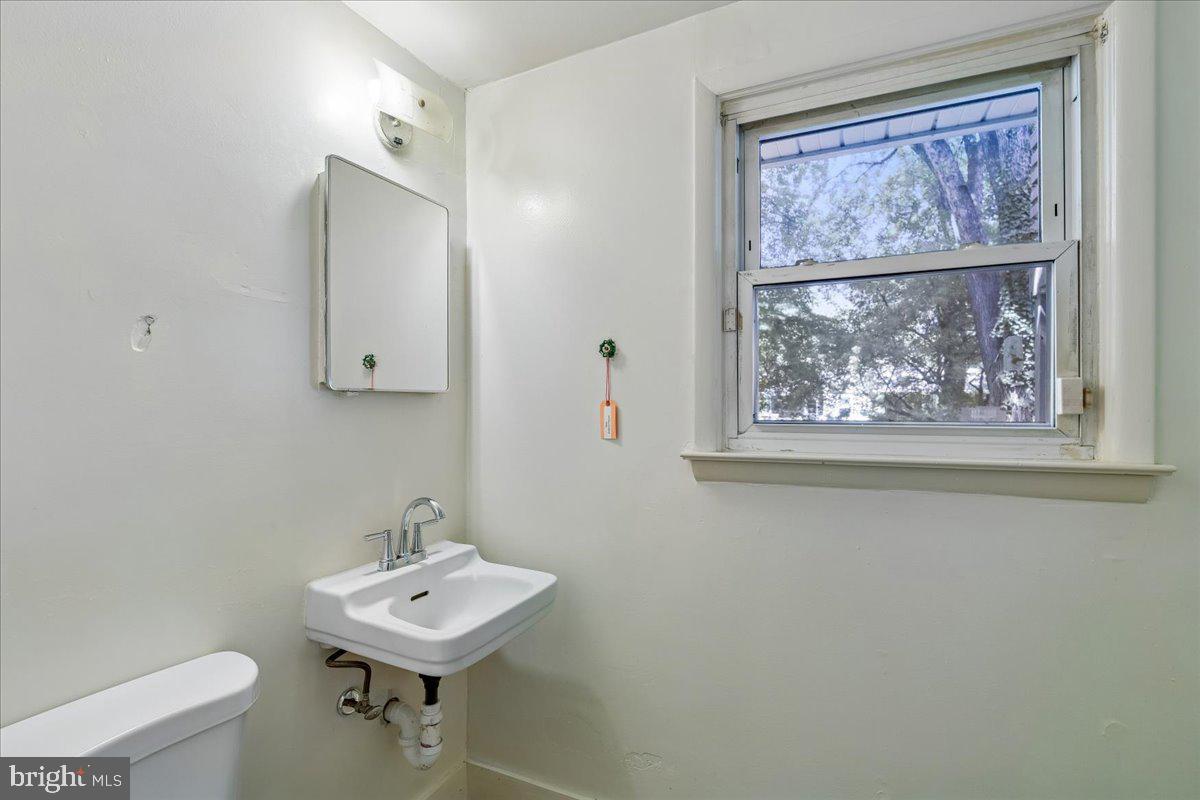 13012 Georgia Avenue Silver Spring, MD 20906 - Photo 25 of 31 Bright and airy bathroom oasis.