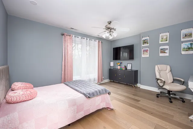 a bedroom with a bed and furniture