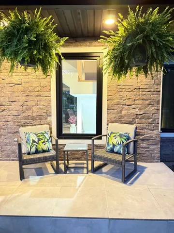 a view of swimming pool with patio